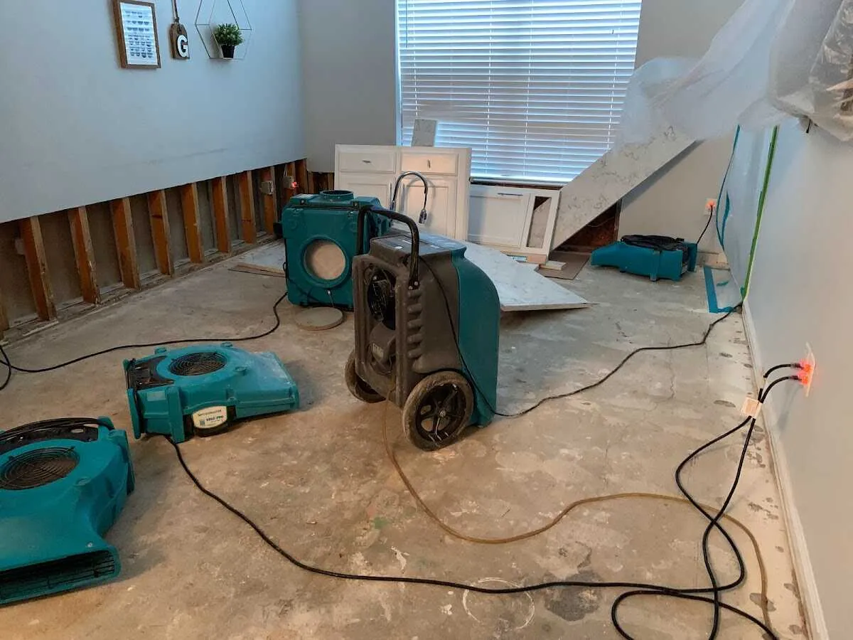 Dehumidifier in flood-cut room for Water Damage Restoration in Wendell